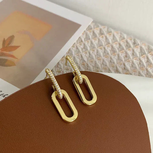 Pendientes de aro brillantes con elegantes colgantes ovalados - pendientes elegantes