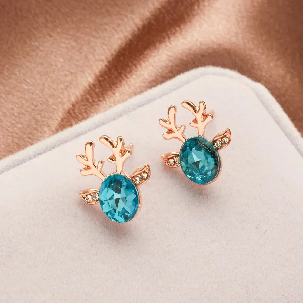 Pendientes festivos con forma de reno con brillantes piedras de cristal ovaladas y purpurina
