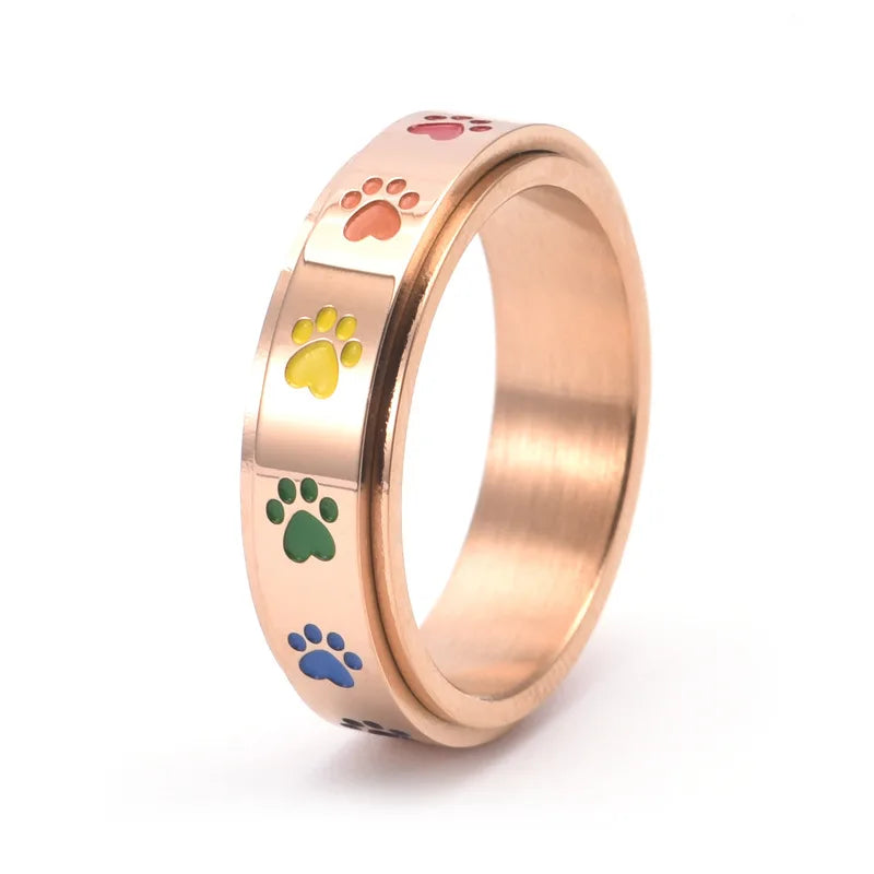 Anillo giratorio para reducción de estrés - Acero inoxidable con patas arcoíris