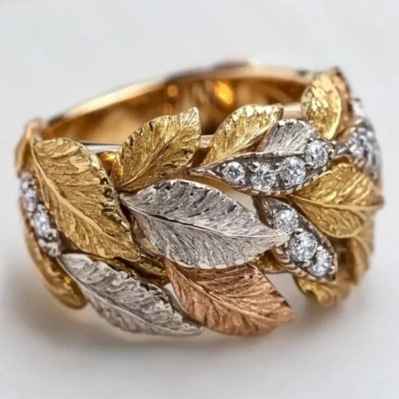 Anillo de Hojas Tricolor – Elegancia Natural en Oro, Plata y Cobre