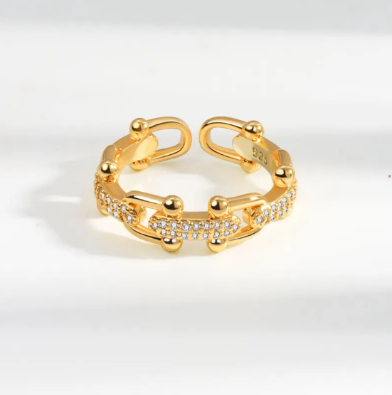 Anillo hueco con diseño de herradura