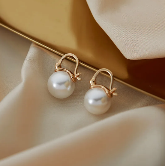 Pendientes de perlas elegantes para mujer con un diseño atemporal y un brillo lujoso