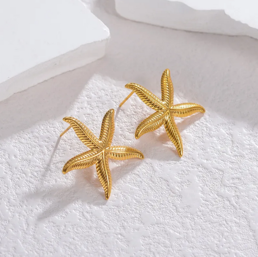 Pendientes de estrella de mar marítimos de metal para una sensación de playa