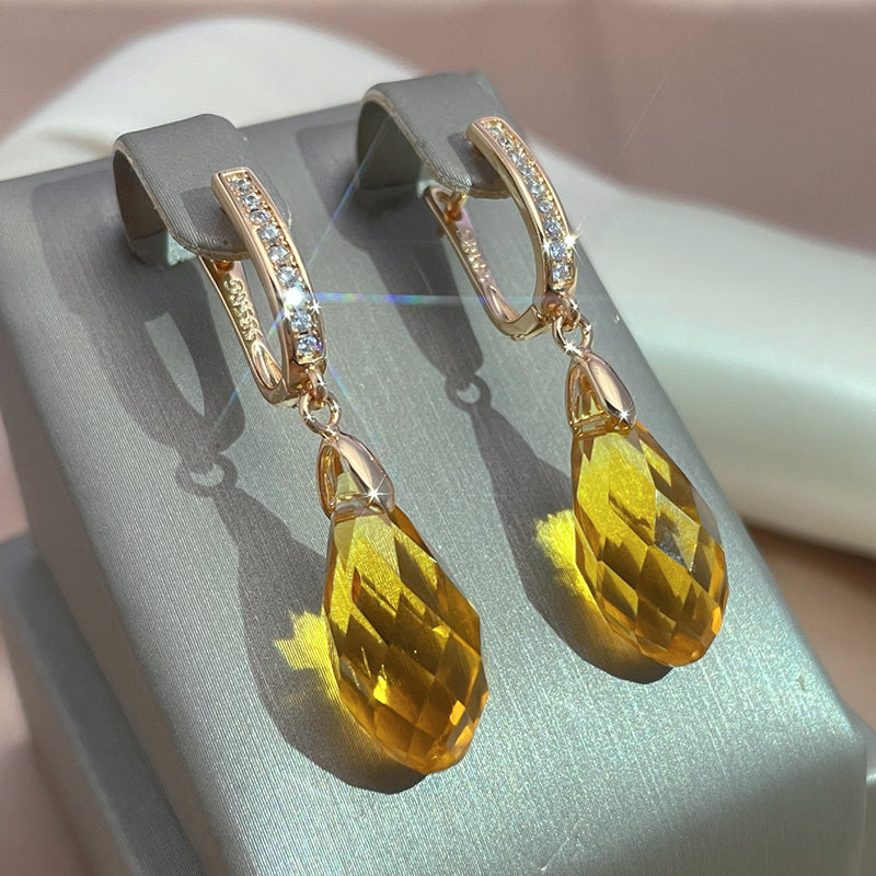 Elegantes pendientes de circonitas con gotas facetadas de cristal amarillo
