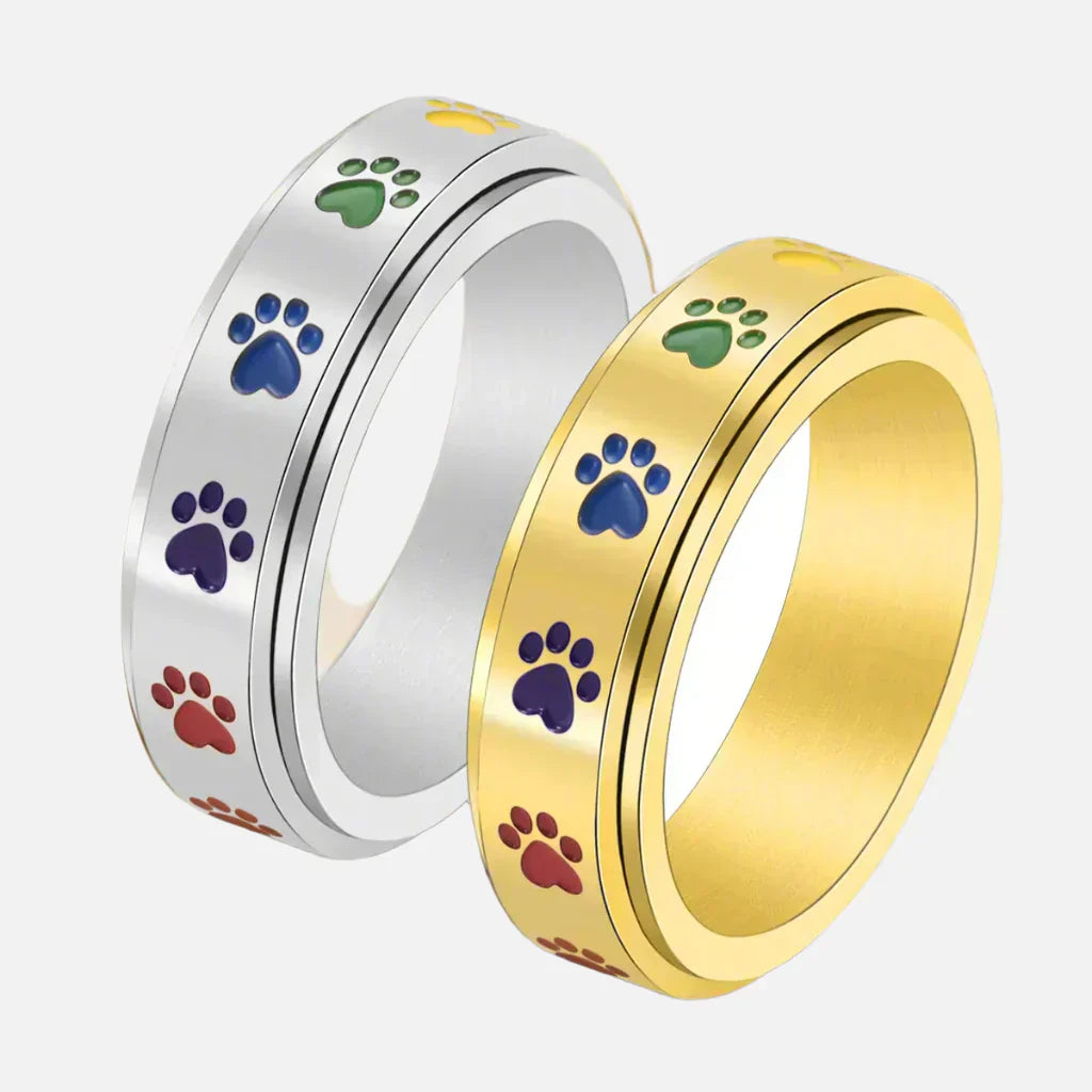 Anillo giratorio para reducción de estrés - Acero inoxidable con patas arcoíris