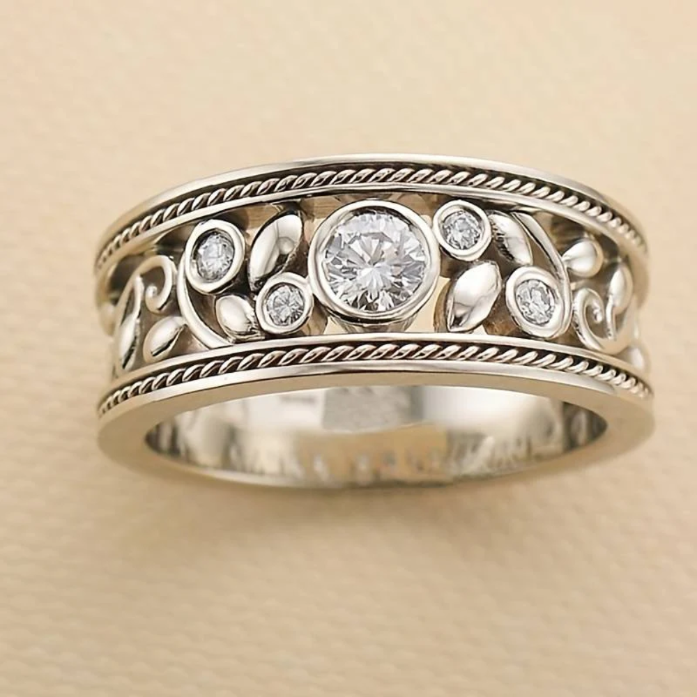 Anillo con flor blanca