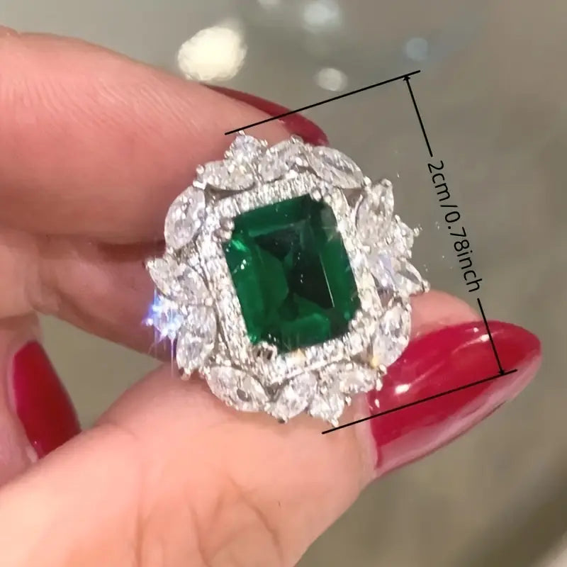 Pendientes lujosos con circonita verde esmeralda y piedras brillantes de talla marquesa