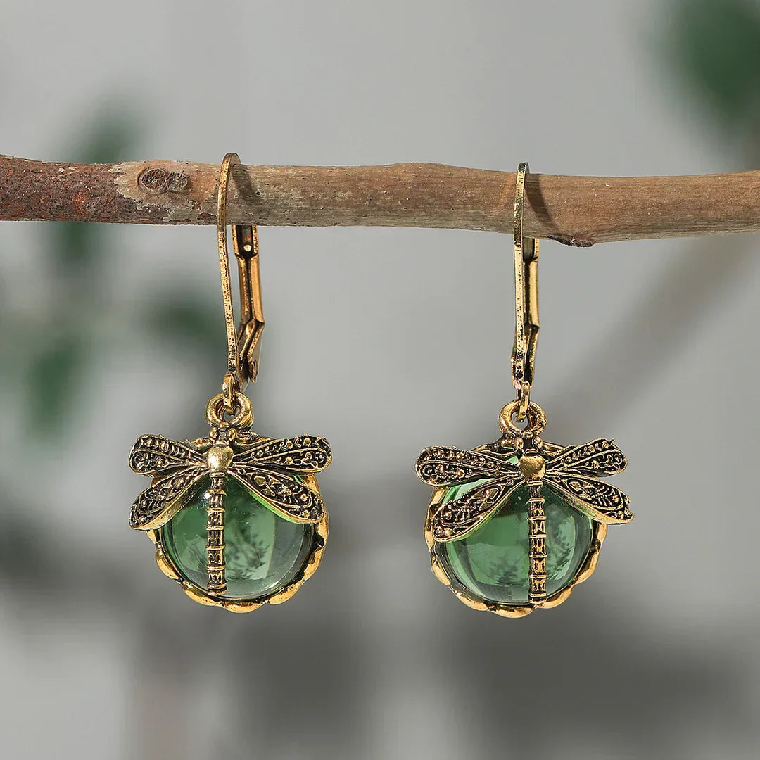 Pendientes de libélula con bolas de cristal brillantes en diferentes colores