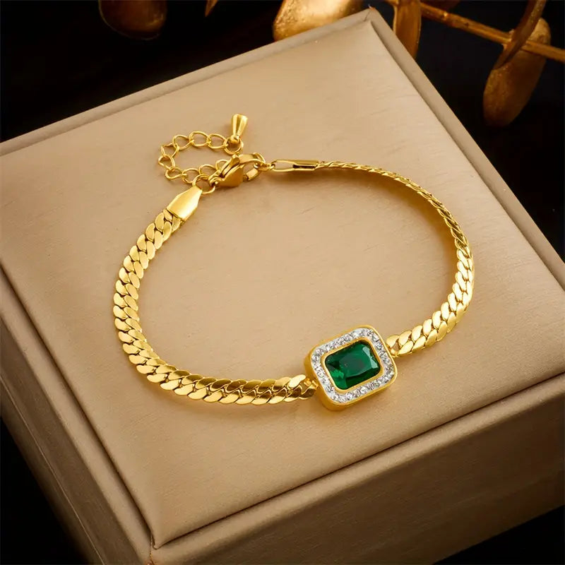 Elegante pulsera de cadena de serpiente con brillantes circonitas verde esmeralda