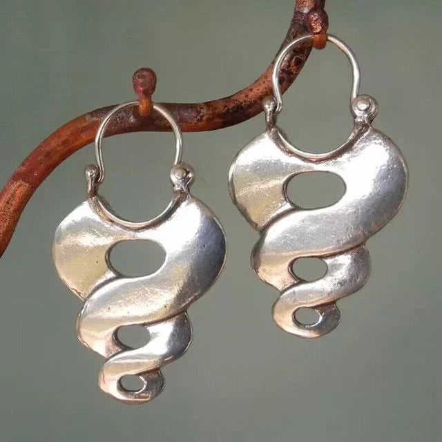 Pendientes espirales vintage con diseño orgánico y forma curva