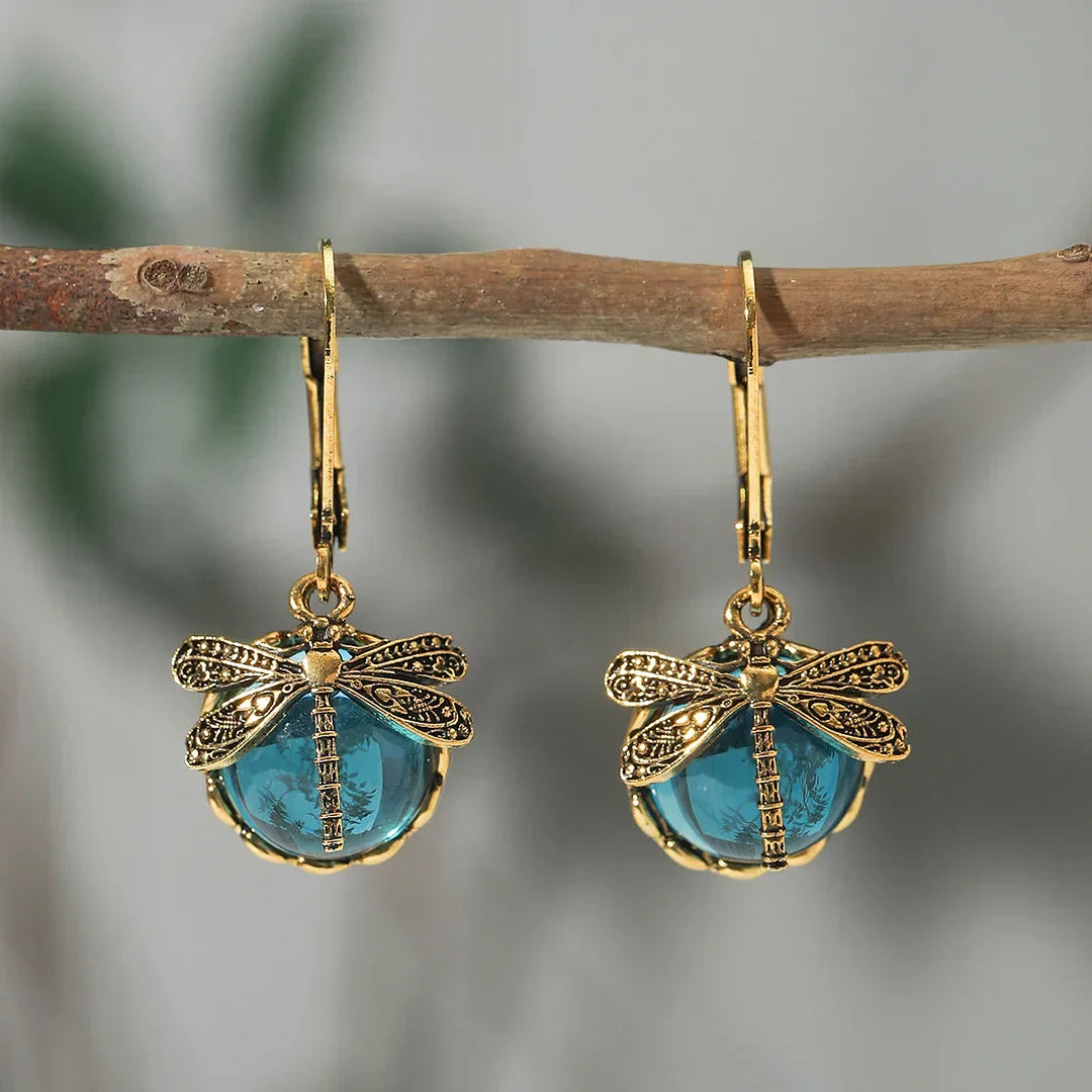 Pendientes de libélula con bolas de cristal brillantes en diferentes colores