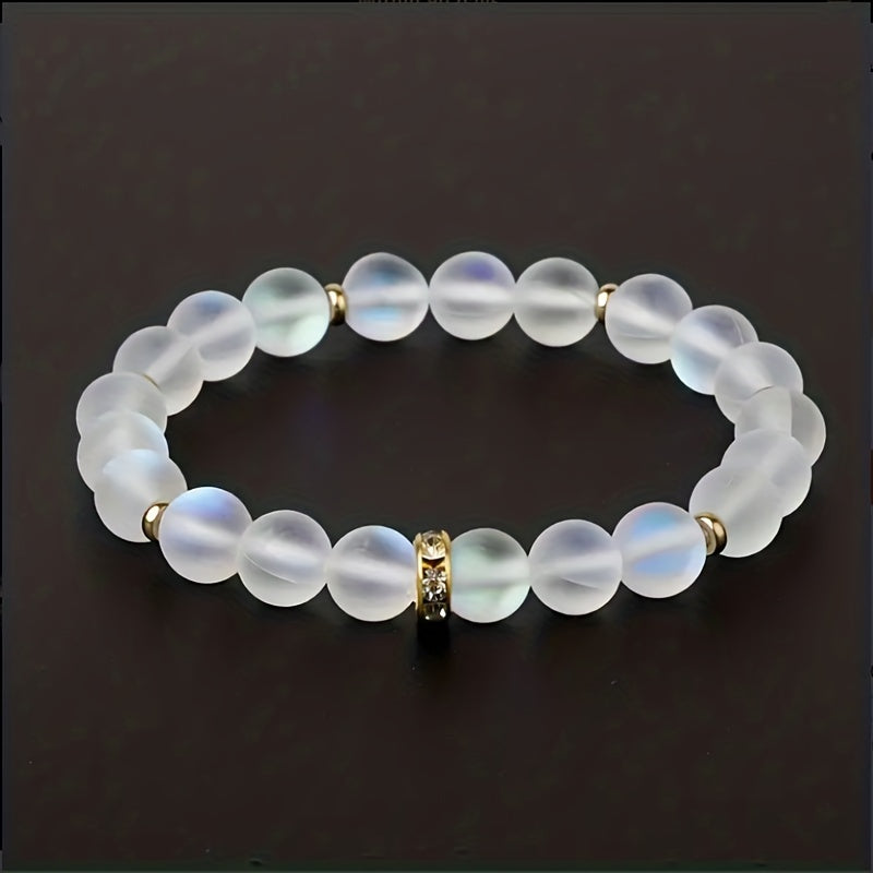 Pulsera de cuentas de piedra lunar iridiscente con detalles de circonitas brillantes