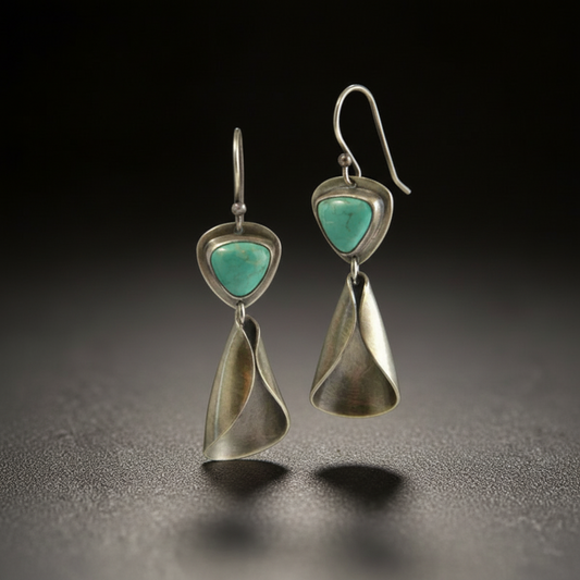 Pendientes bohemios de color turquesa con un elegante diseño de lágrima