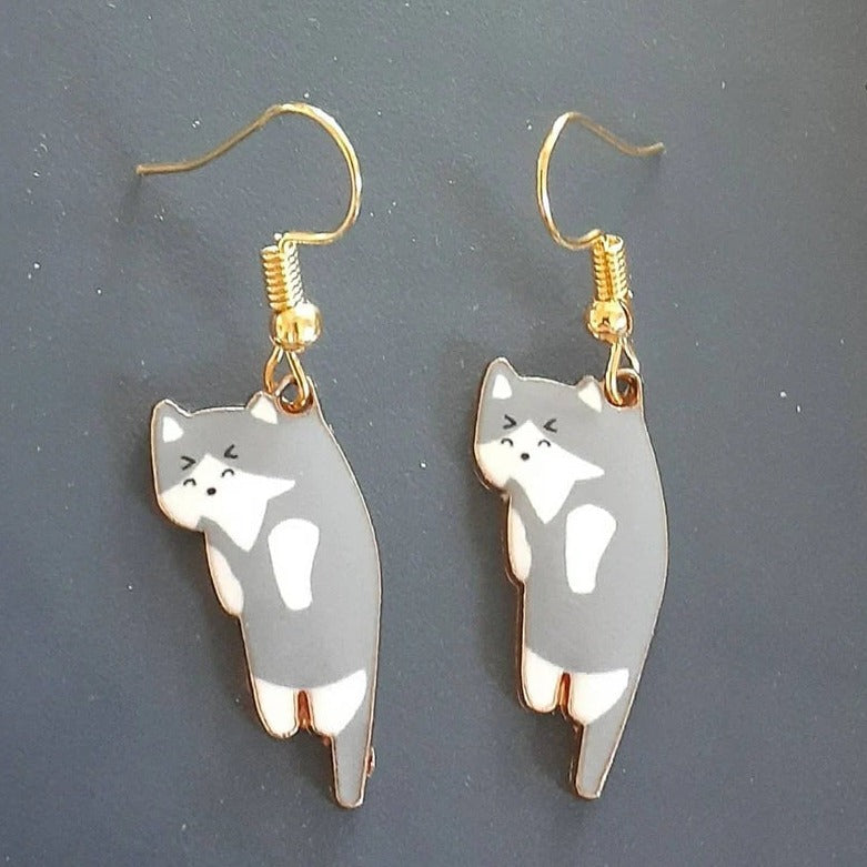 Lindos pendientes de gato de dibujos animados con un divertido diseño colgante