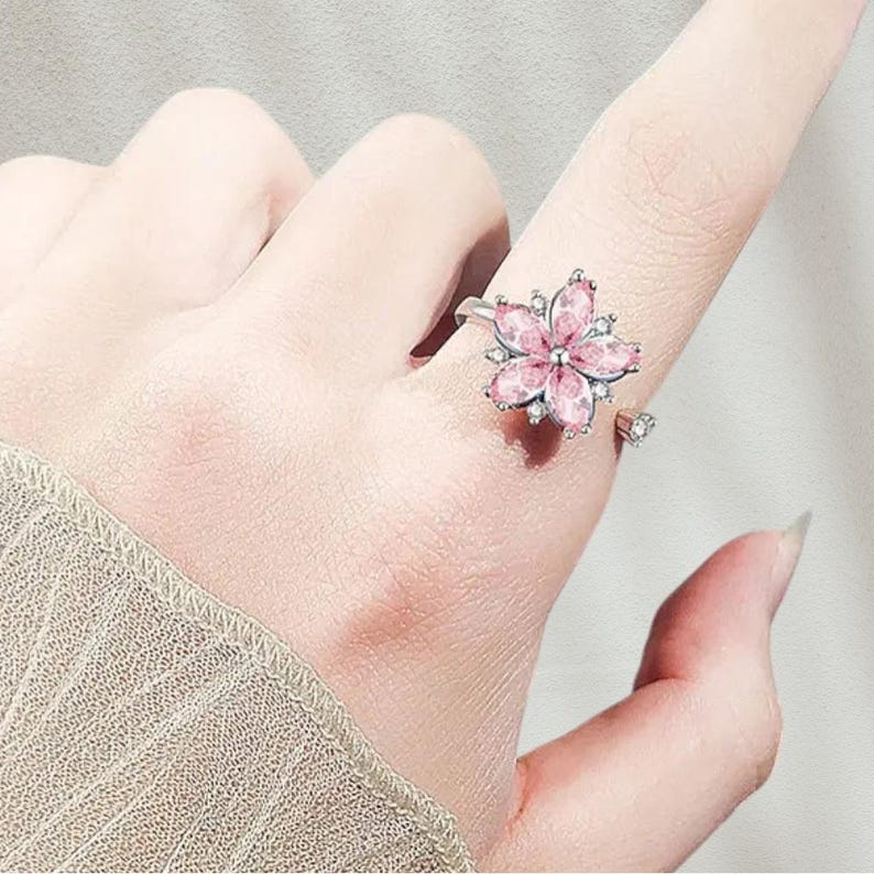 Anillo Clarisa flores giratorio con circón - Sparkano Marbella