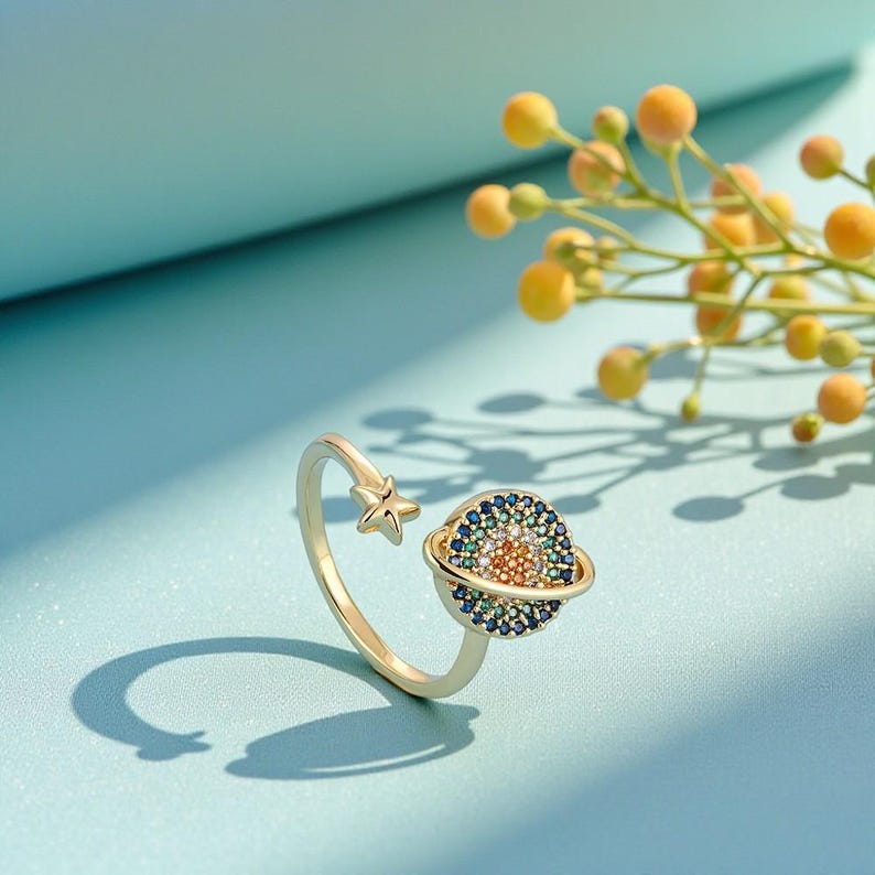 Áurea anillo giratorio planetario con circonitas - Sparkano Marbella