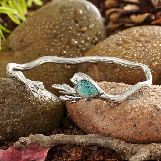 Brazalete con diseño de pájaro en rama turquesa y acabado antiguo