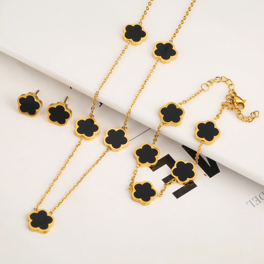 Elegante conjunto de joyas en forma de trébol con incrustaciones de piedras de colores