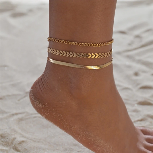 Conjunto de tobilleras brillantes para mujer con diseño de espiga y figura