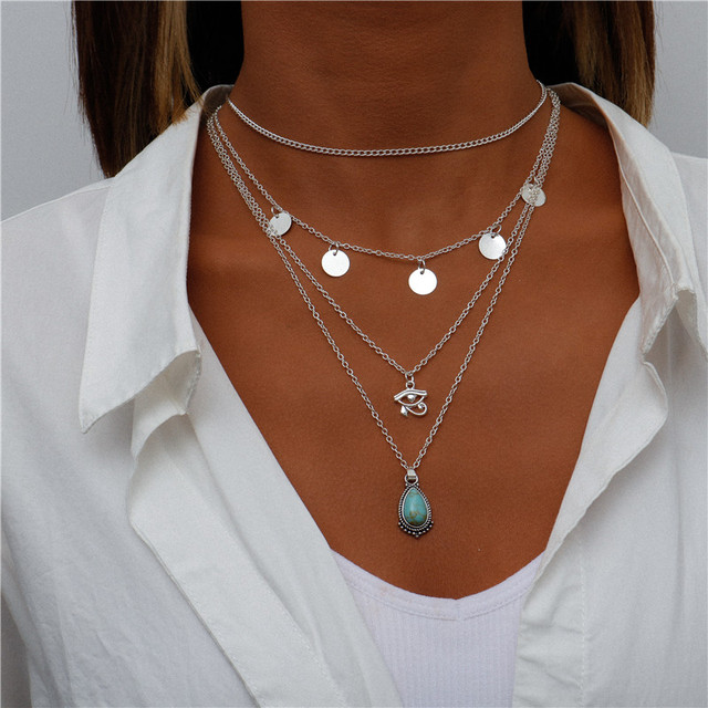 Collar llamativo en capas con gotas de turquesa y Ojo de Horus