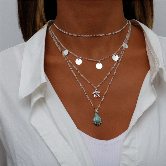 Collar llamativo en capas con gotas de turquesa y Ojo de Horus