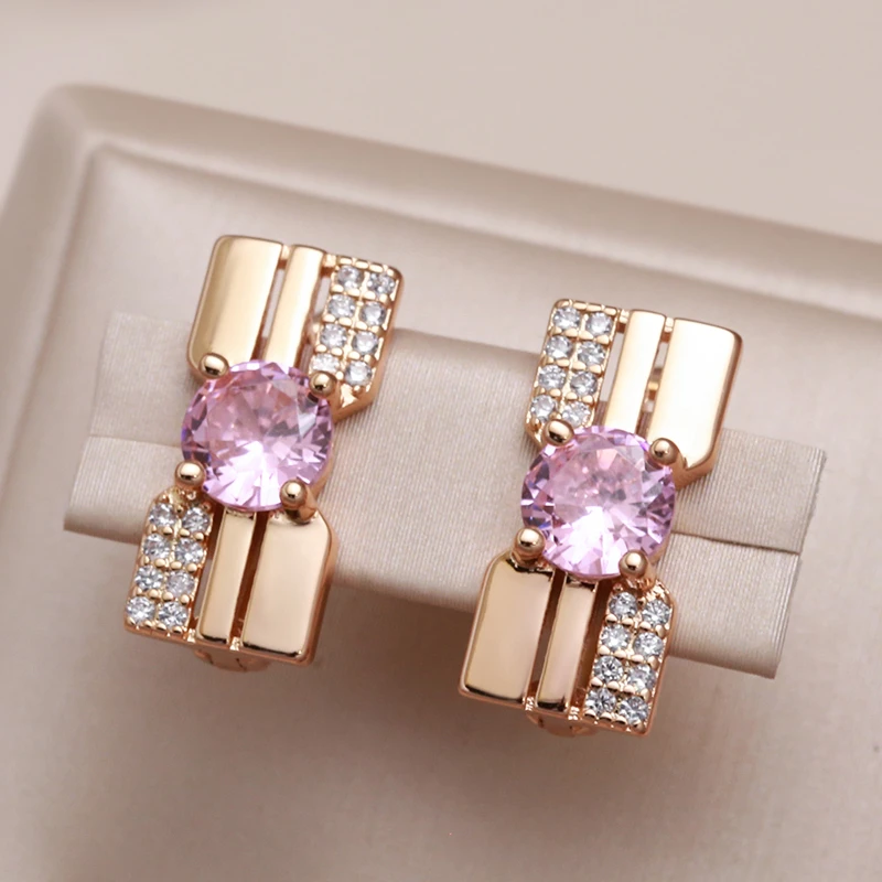Pendientes elegantes con circonitas rosas y diamantes brillantes