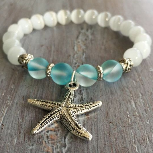 Pulsera marítima con colgante de estrella de mar y cuentas de cristal azul