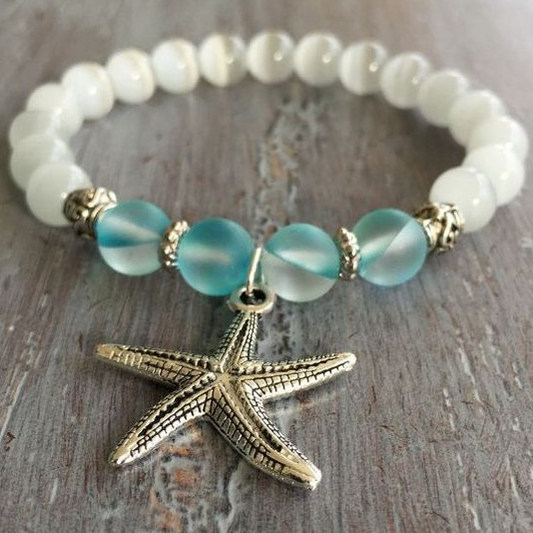 Pulsera marítima con colgante de estrella de mar y cuentas de cristal azul