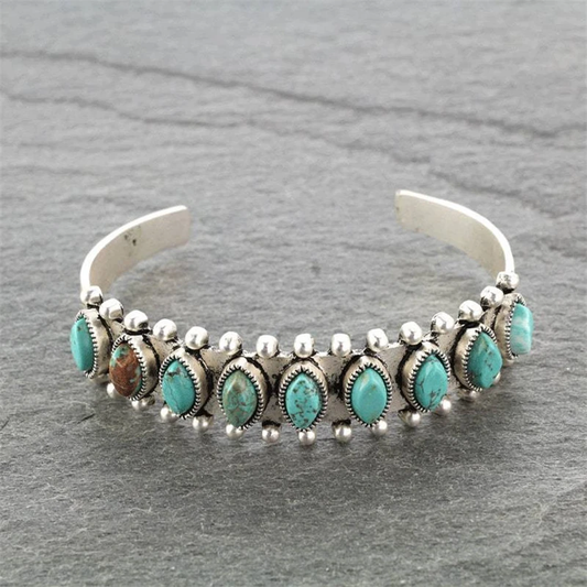 Pulsera vintage de turquesa con detalles únicos y estilo antiguo