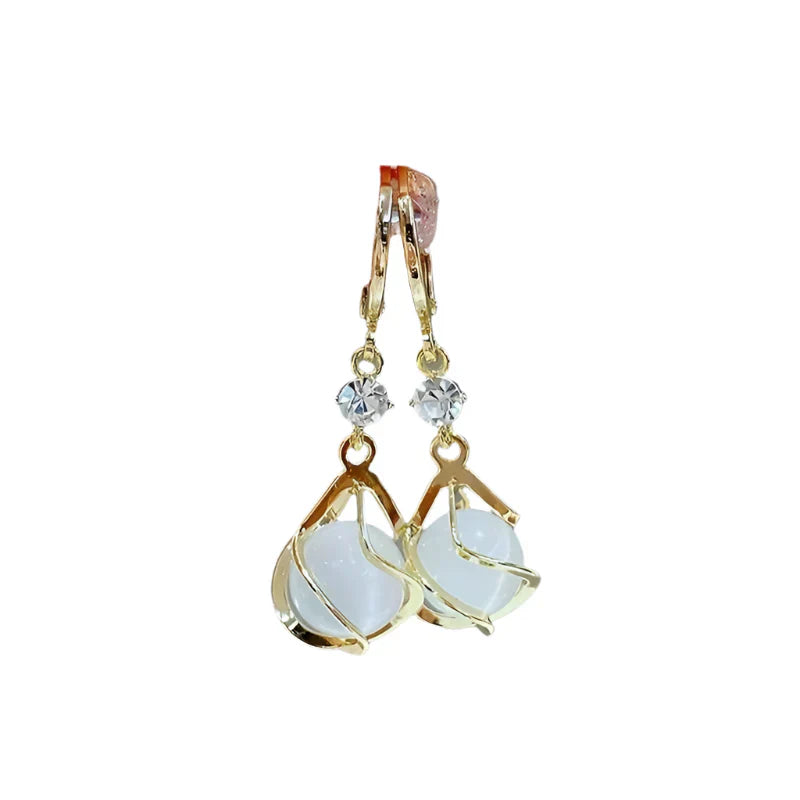 Pendientes colgantes elegantes con circonitas y cabujones