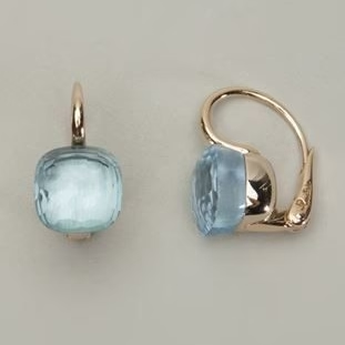 Pendientes vintage con circonitas celestes y elegante cierre de clip