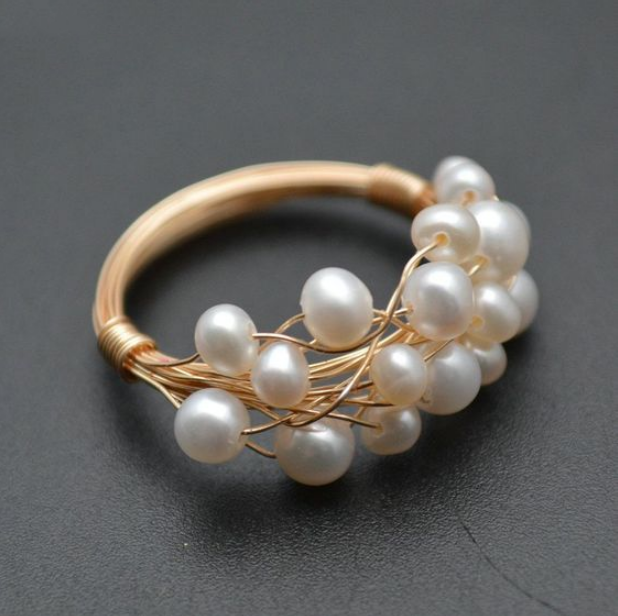 Anillo ola de mar con ópalo