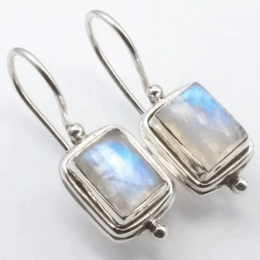 Pendientes elegantes con piedras de luna rectangulares brillantes