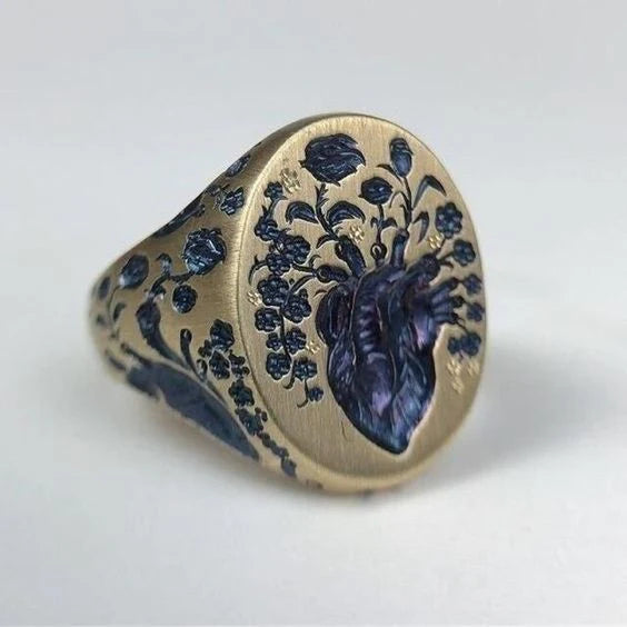 Anillo vintage dorado con flores azules