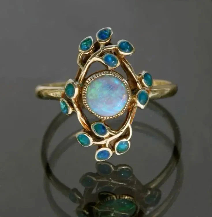 Anillo Floral Vintage con Pal de Ópalo y Piedras Turquesa