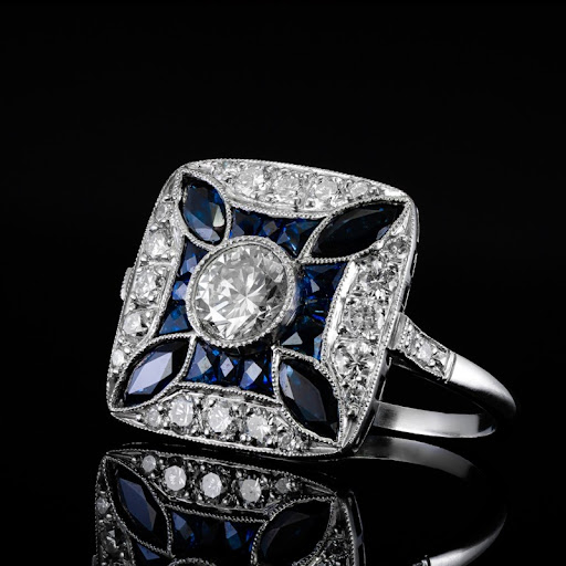 Anillo brillante con circonita azul oscuro