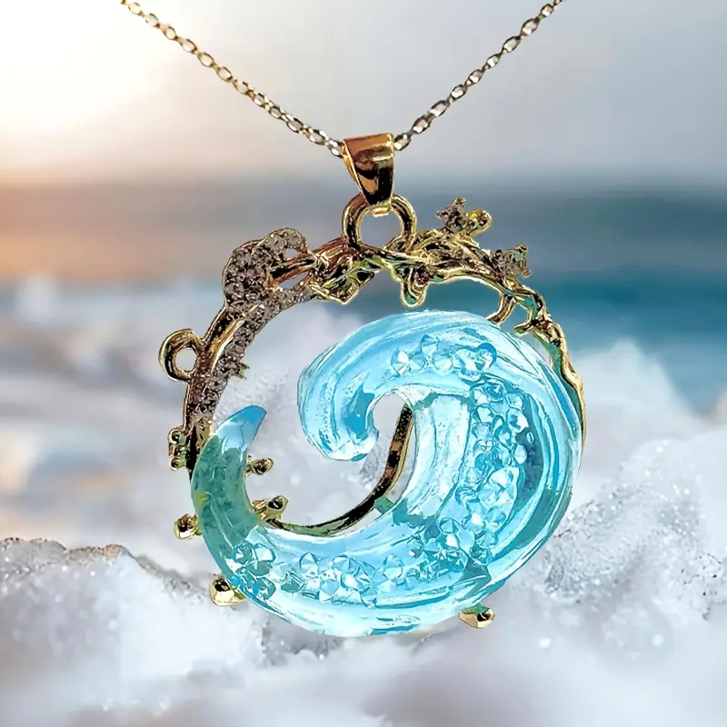 Collar de olas azul océano con delicado diseño de zarcillo