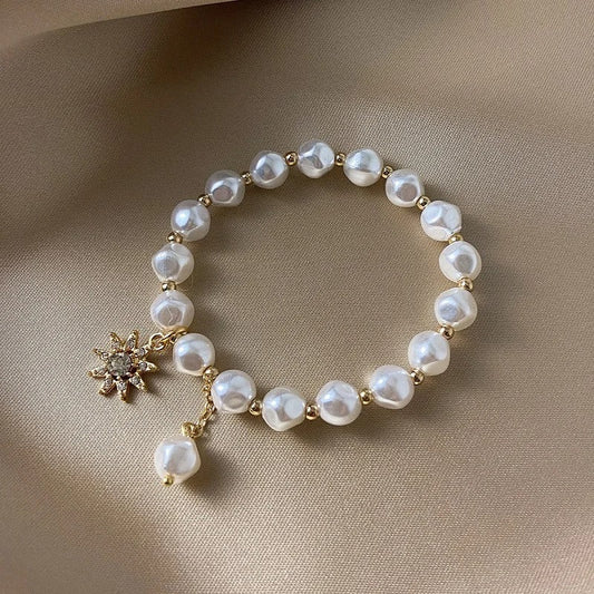 Elegante pulsera de perlas de agua dulce con brillantes estrellas y collar de perlas