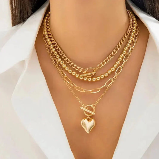 Collar llamativo multicapa con colgante de corazón y combinación de cadenas