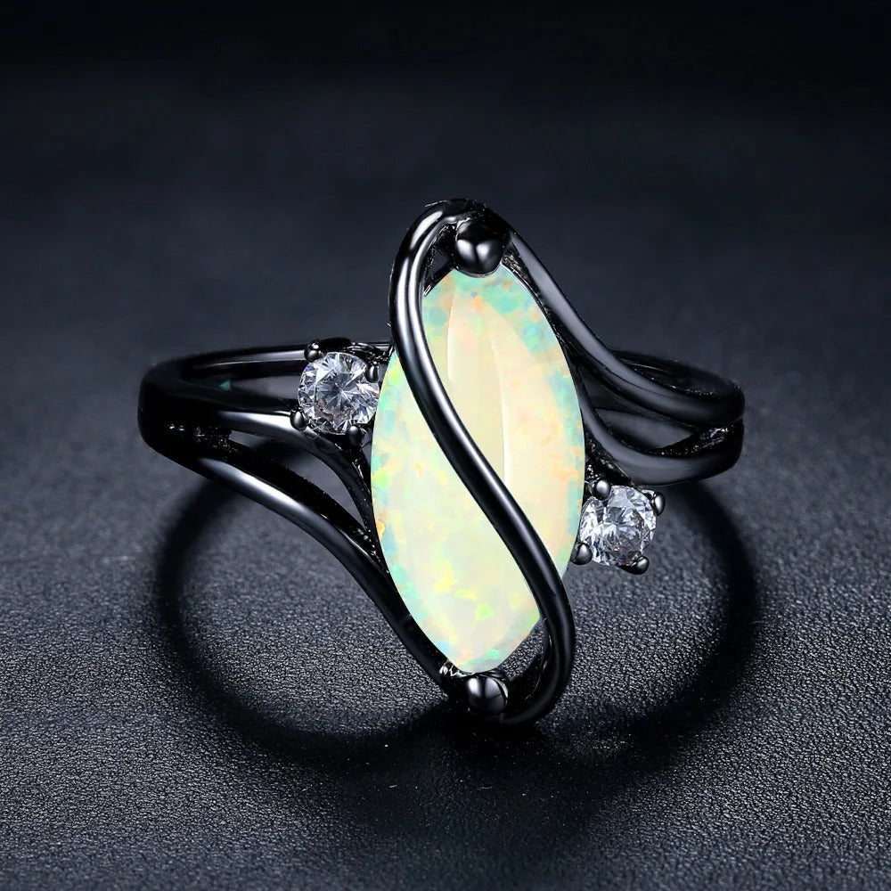 Anillo vintage negro con ópalo plateado